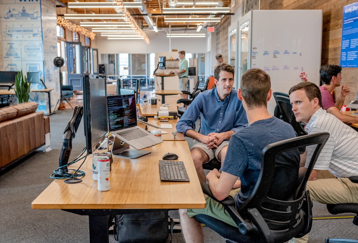 An open-plan office with a team planning the months ahead