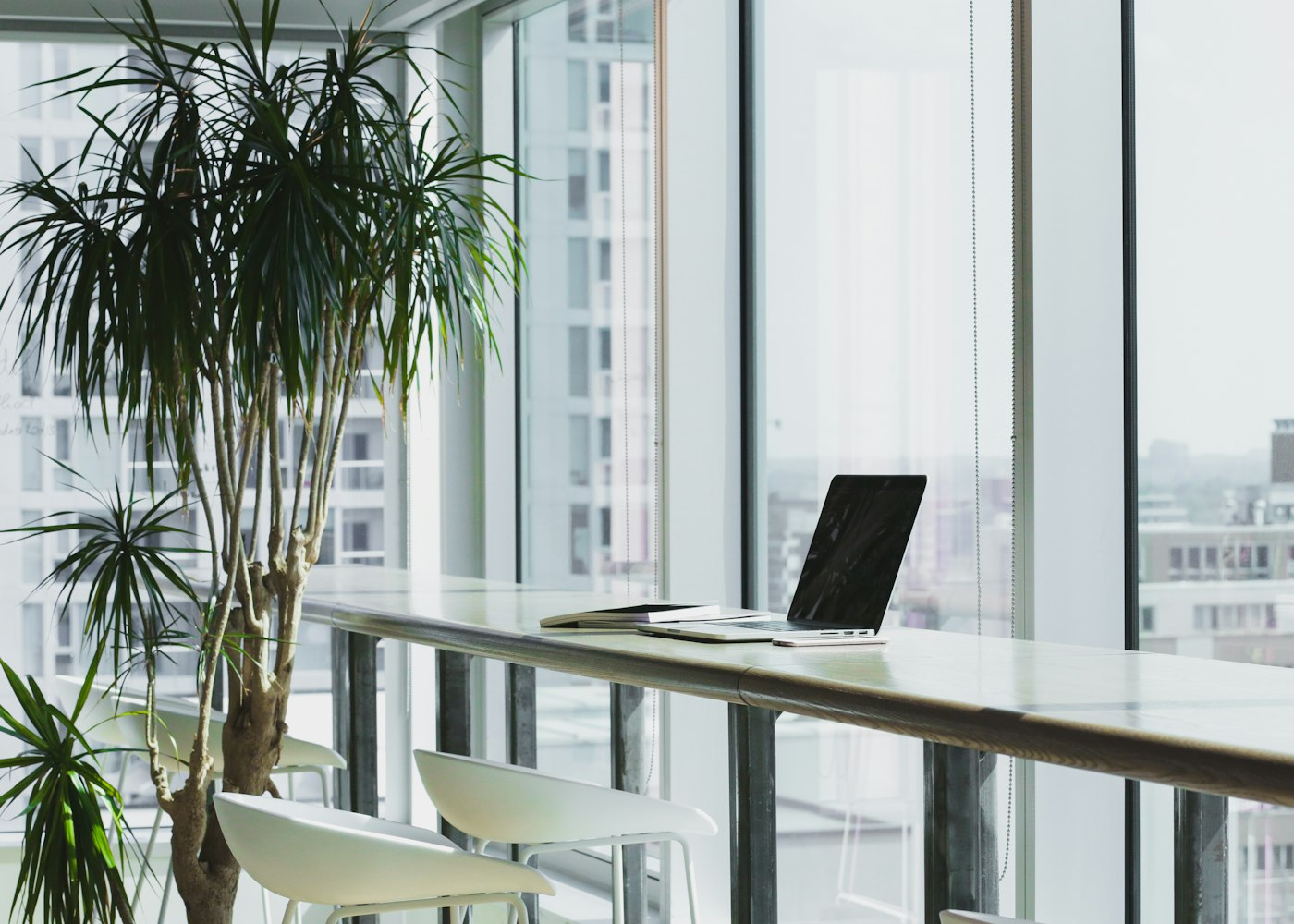 A calm office workspace set up for running the monthly payroll